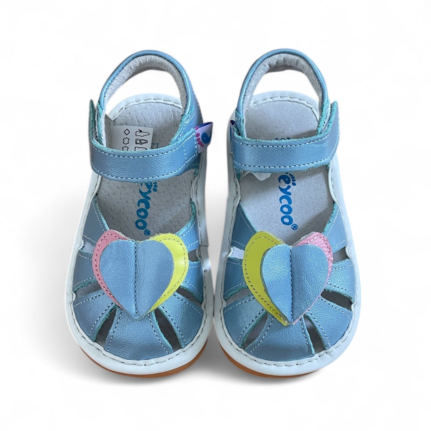 kids sandals with cute hearts and removable squeakers. Toddler shoes ready for compliments.