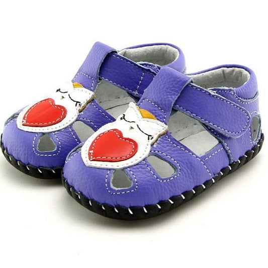 Leather girls' sandals with sweet heart detail. Tiny feet deserve fairy tales. Open design for cool comfort, soft soles for natural barefoot style steps.