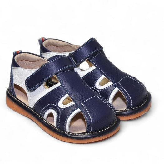 Sunny Strides Kids’ Sandals Genuine Leather for Toddlers. Some kids' shoes just feel special, don't they? These sandals are one of them. The removable squeakers add some fun and navy/white style for all occasions.