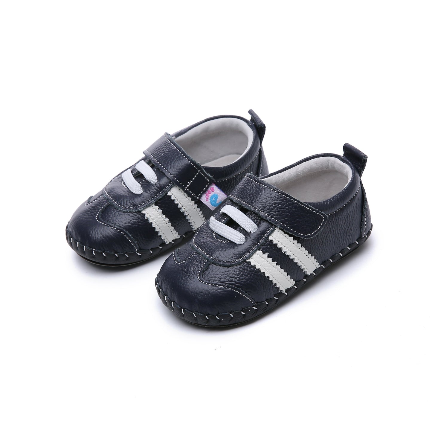 Tiny Titans First Walker Kids’ Shoes Soft Sole Sneakers. Support your toddler's first steps with Tiny Titans' first walker kids' sneakers. Soft leather, comfortable & stylish. Perfect baby shoes for growing feet!