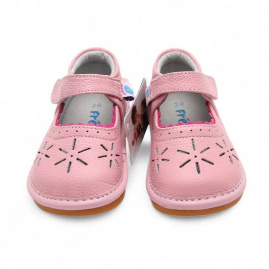 Tulip Twirls squeaky kids shoes. Adorable pink pumps for girls with a tulip design, removable squeakers, and soft, breathable materials. Perfect for toddler fun.
