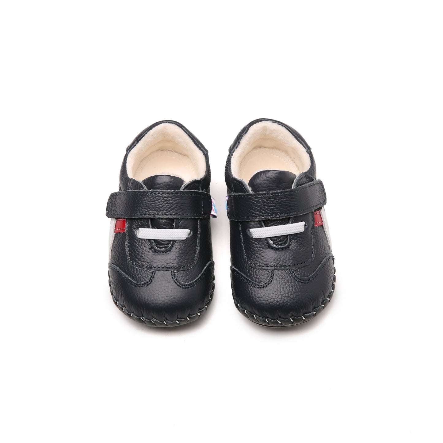 dark blue leather infant shoes with white stitching, laces, and adjustable velcro closure