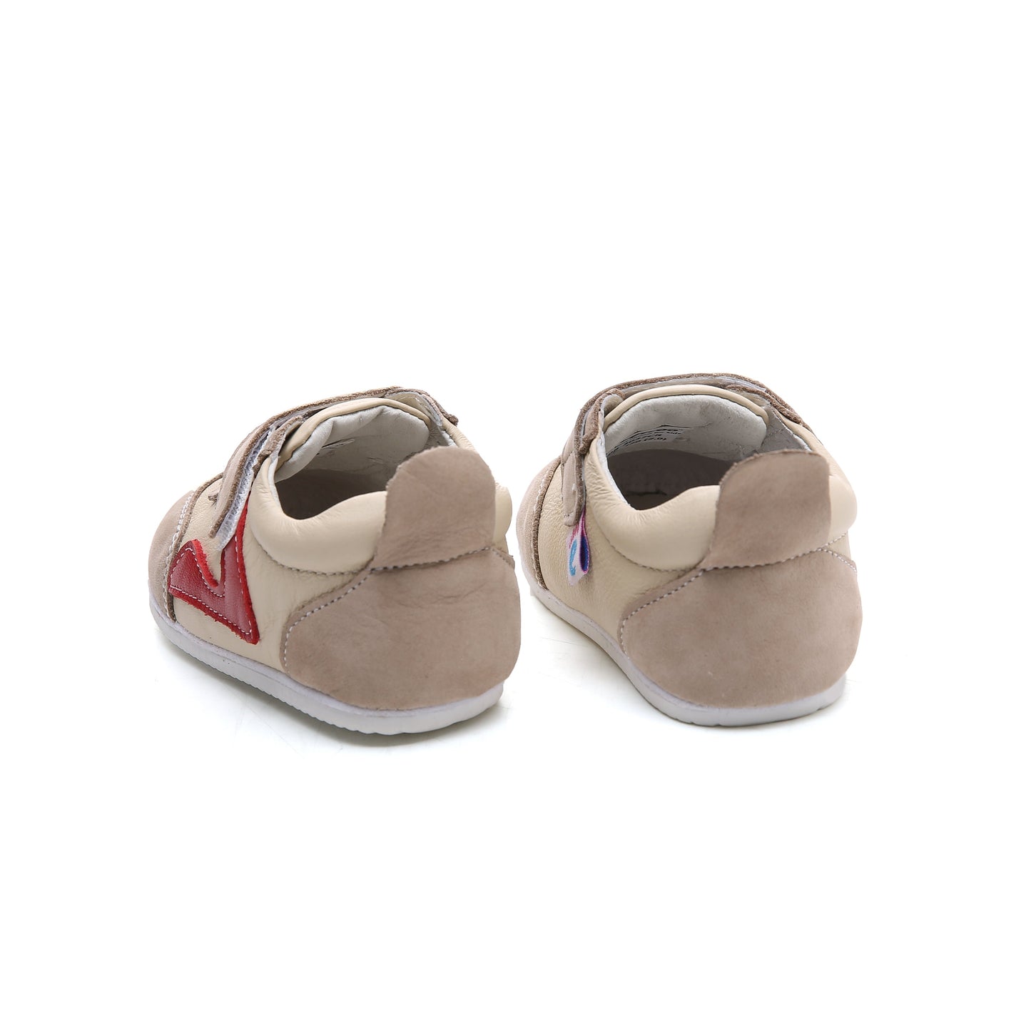 light pink and rose toddler sneakers with soft suede accents and flexible white outsole
