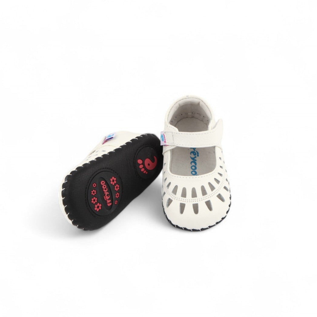 white baby kids shoes cutouts velcro flexible sole