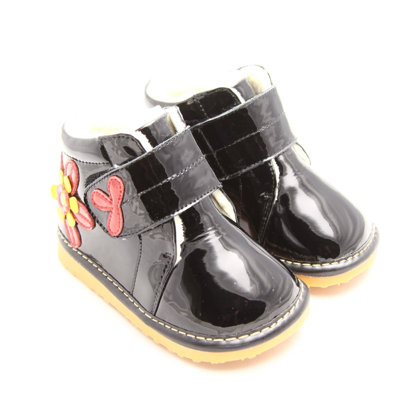 Buy soft leather squeaky ankle boots with flower detail