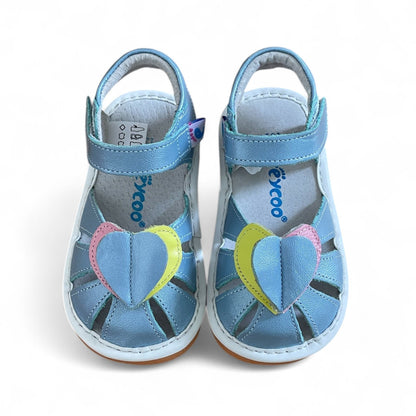 kids sandals with cute hearts and removable squeakers. Toddler shoes ready for compliments.