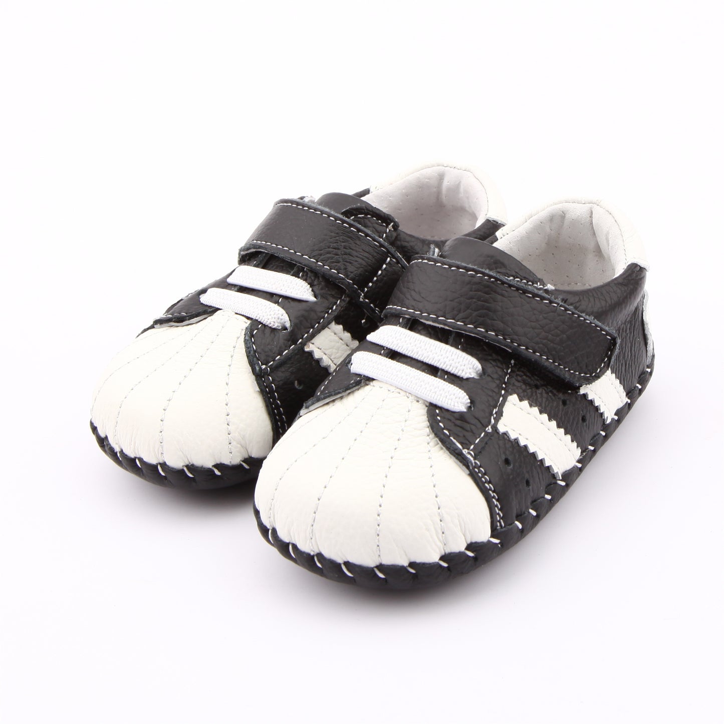 Hopscotch Heroes Retro Kids’ Sneakers with Velcro, Two-Tone Style. Capture that authentic vintage cool look with these stylish, two-tone kid's sneakers. Hopscotch Heroes are stylish, comfortable, and perfect for everyday play.