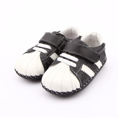 Hopscotch Heroes Retro Kids’ Sneakers with Velcro, Two-Tone Style. Capture that authentic vintage cool look with these stylish, two-tone kid's sneakers. Hopscotch Heroes are stylish, comfortable, and perfect for everyday play.