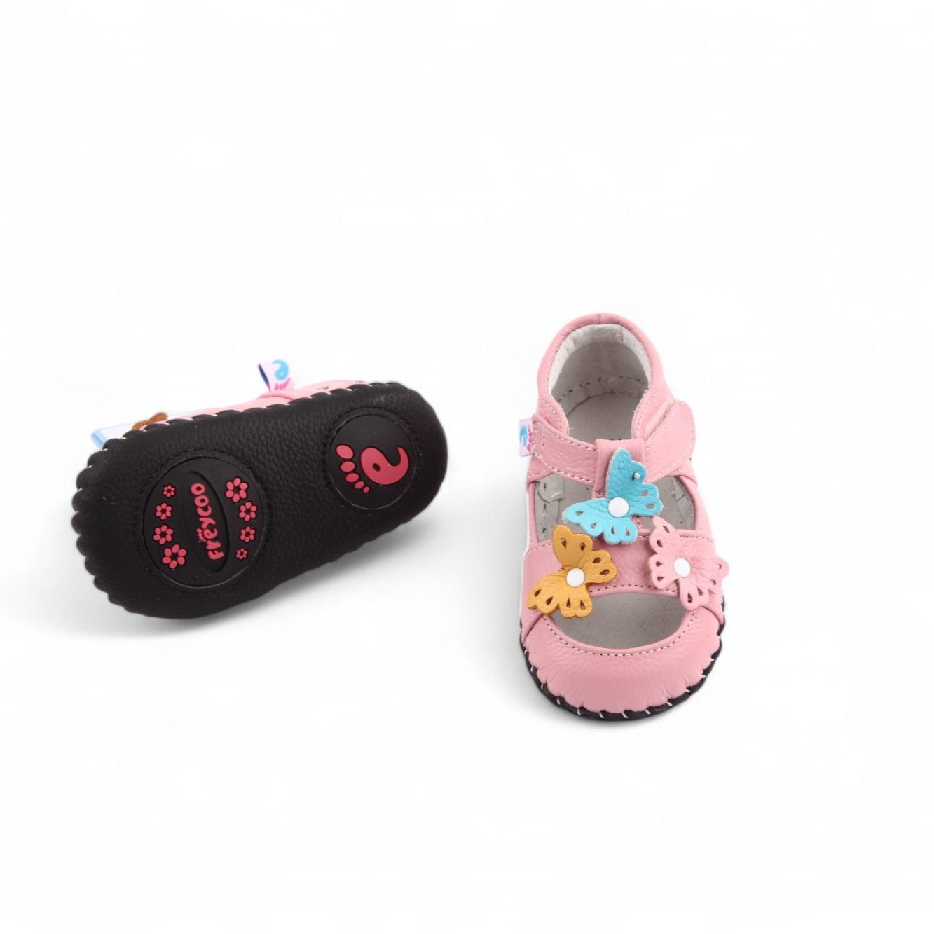 Light pink kids sandals with butterfly and flower details