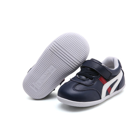 Sporty design kids' shoes made from soft leather, with a comfy fit and easy Velcro strap. Navy, white or playful pink kids' sneakers for active toddlers!