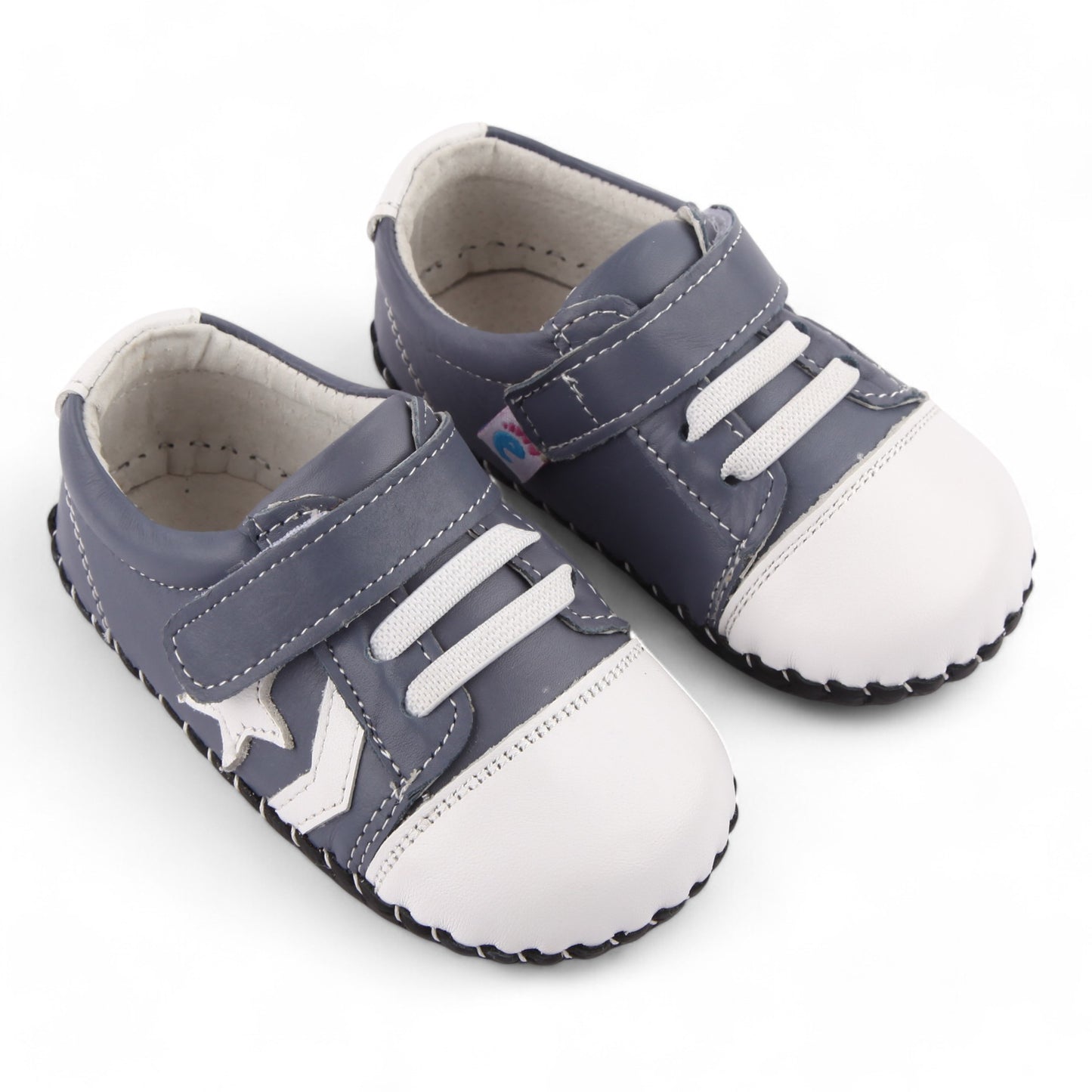 Little Rockets Kids’ Sneakers Sporty Toddler’s First Walkers. Sporty kids' sneakers for first walkers with star detail. Easy Velcro strap, and padded support for growing feet. Perfect for little explorers.