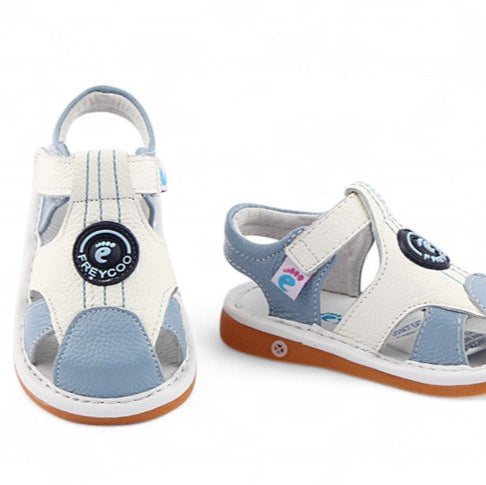 Tide Treads Kids’ Sandals with Velcro strap for easy fit. Make a splash with Tide Treads kids' sandals. Cool and comfy two-tone style, with built-in removable squeakers and a secure fit for little baby feet ready to explore.