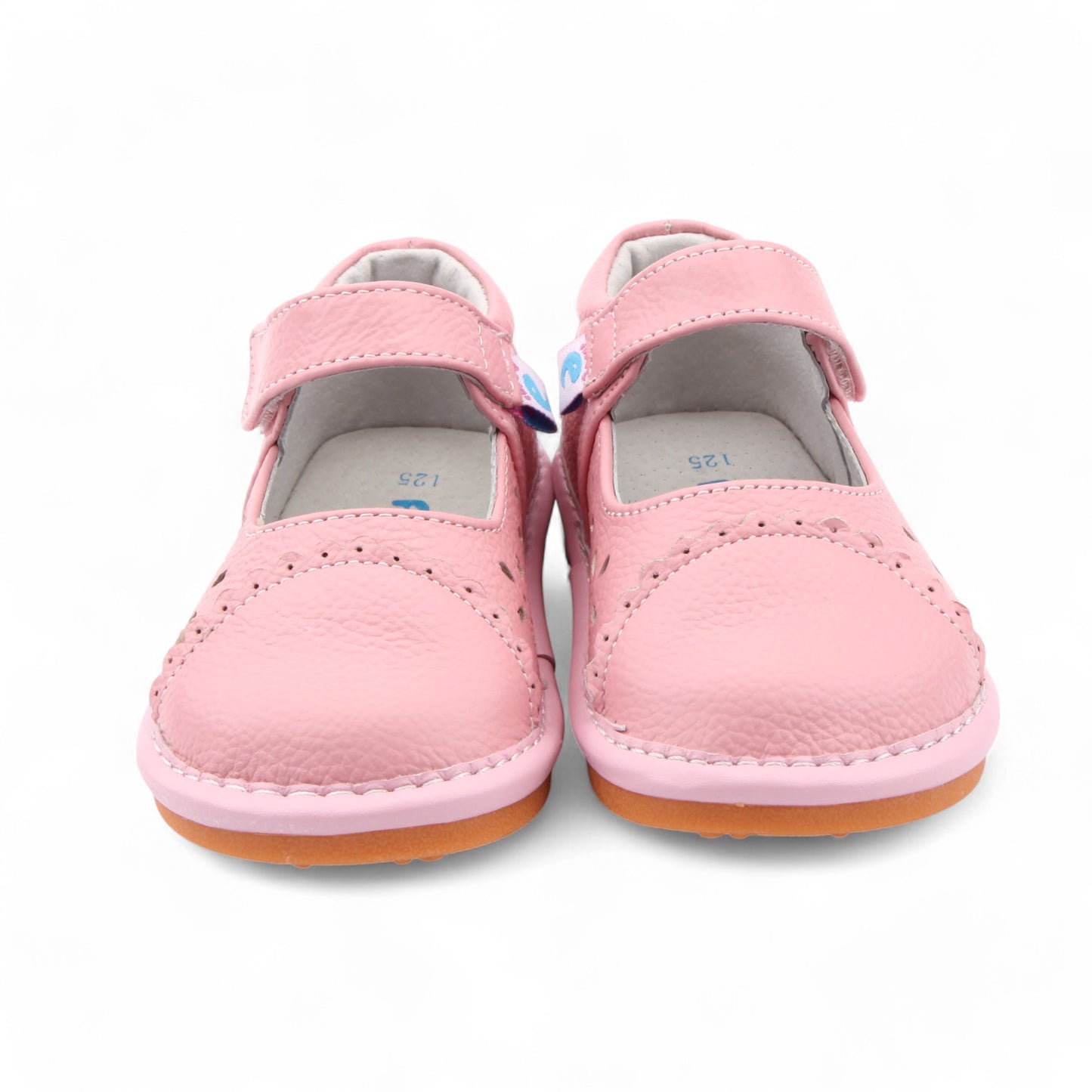 Twinkle Tots Cute Kids Shoes with Removable Squeakers. Twinkle Tots pink Mary Janes with removable squeakers, add magic to every adventure! Cute girl's shoes with strap and cut-out detail for toddlers.