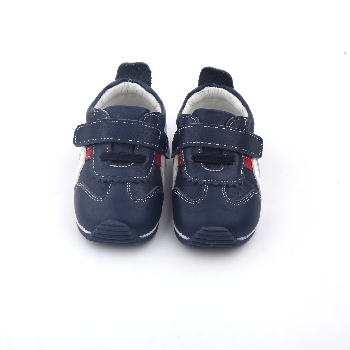 navy blue baby sneakers with red and white accents and velcro straps