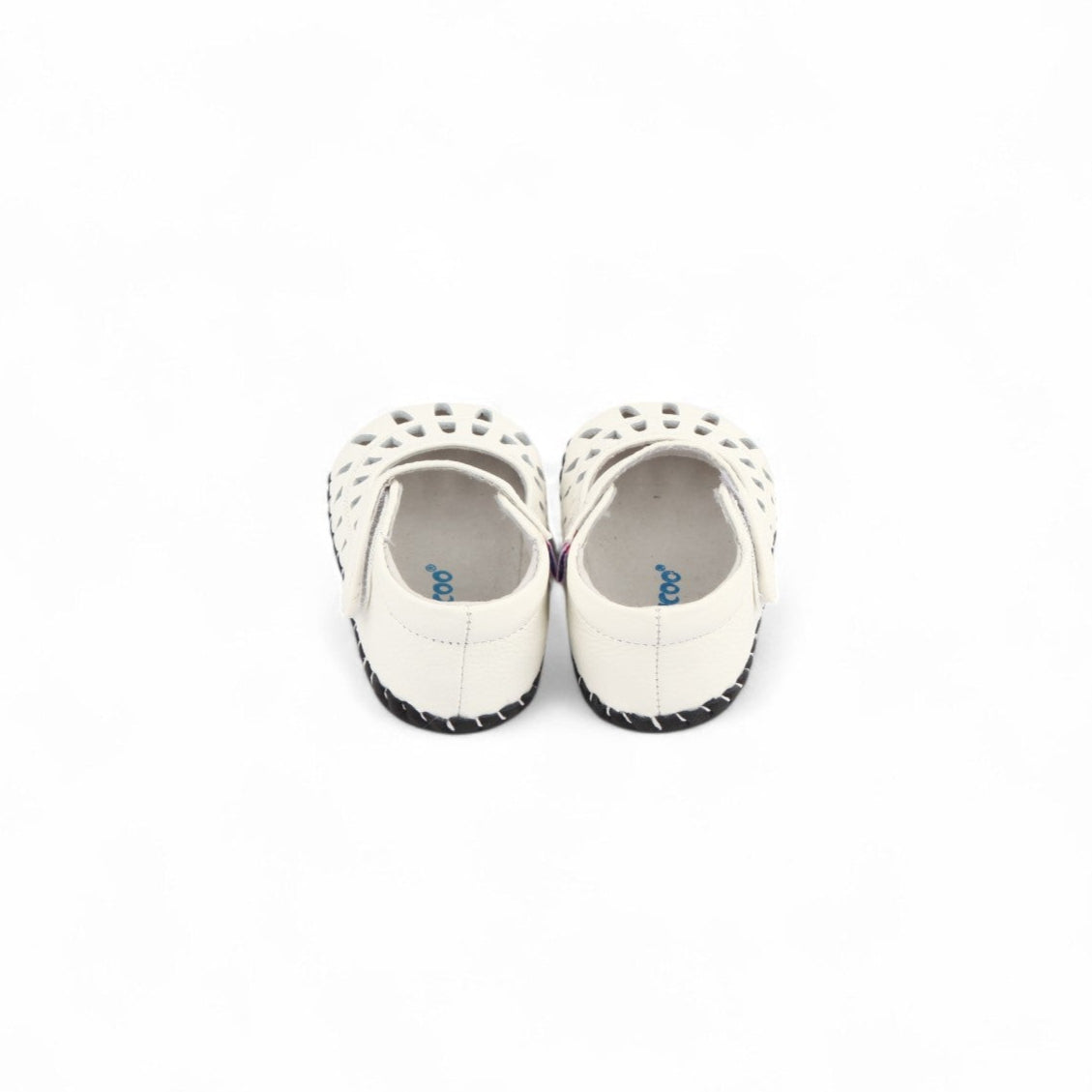 toddler girl shoes with geometric cut-out pattern and visible velcro strap